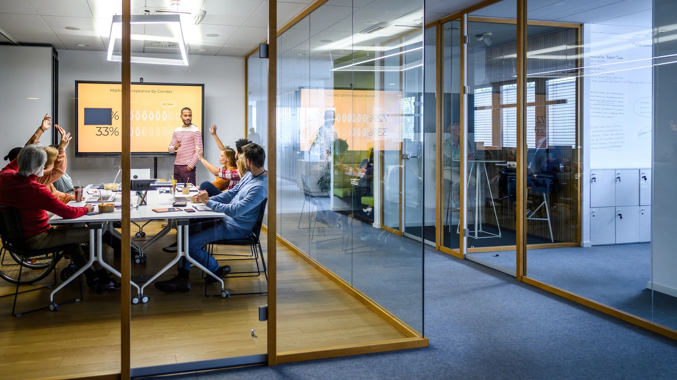 Professional presenting strategy in a glass boardroom